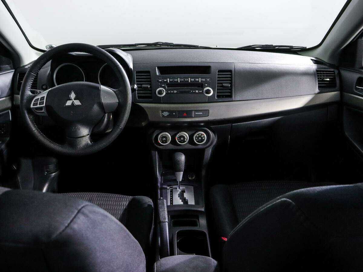 Купить Mitsubishi Lancer с пробегом. Фото: #11