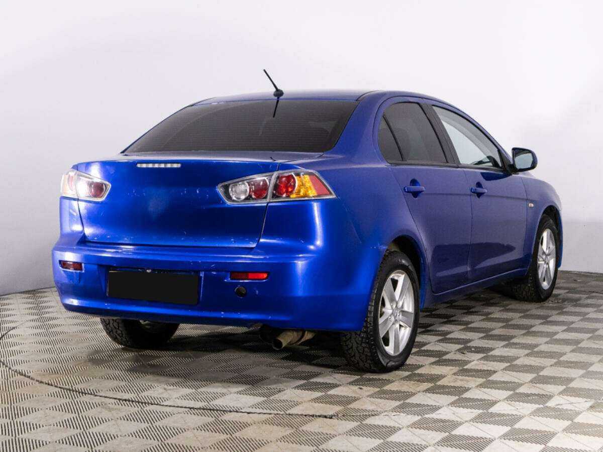 Купить Mitsubishi Lancer с пробегом. Фото: #4