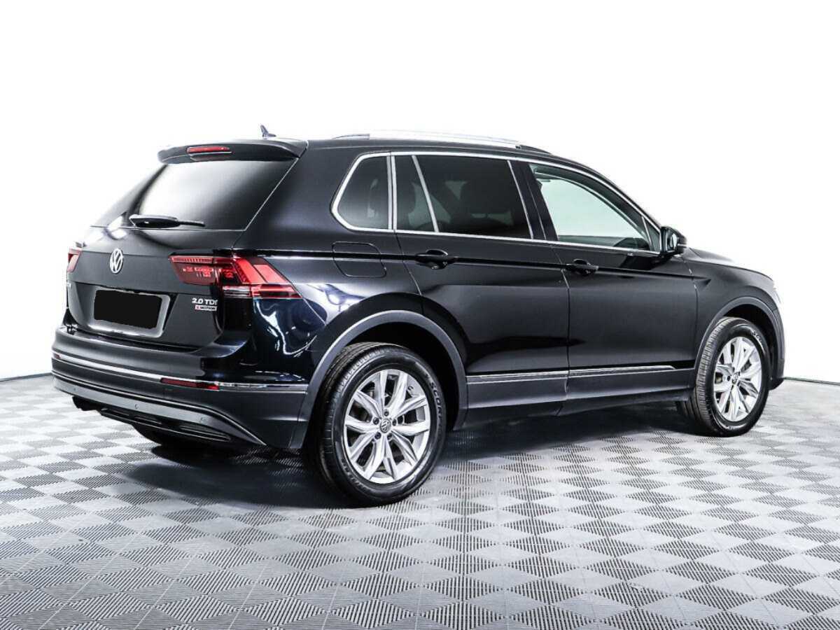 Купить Volkswagen Tiguan с пробегом. Фото: #4