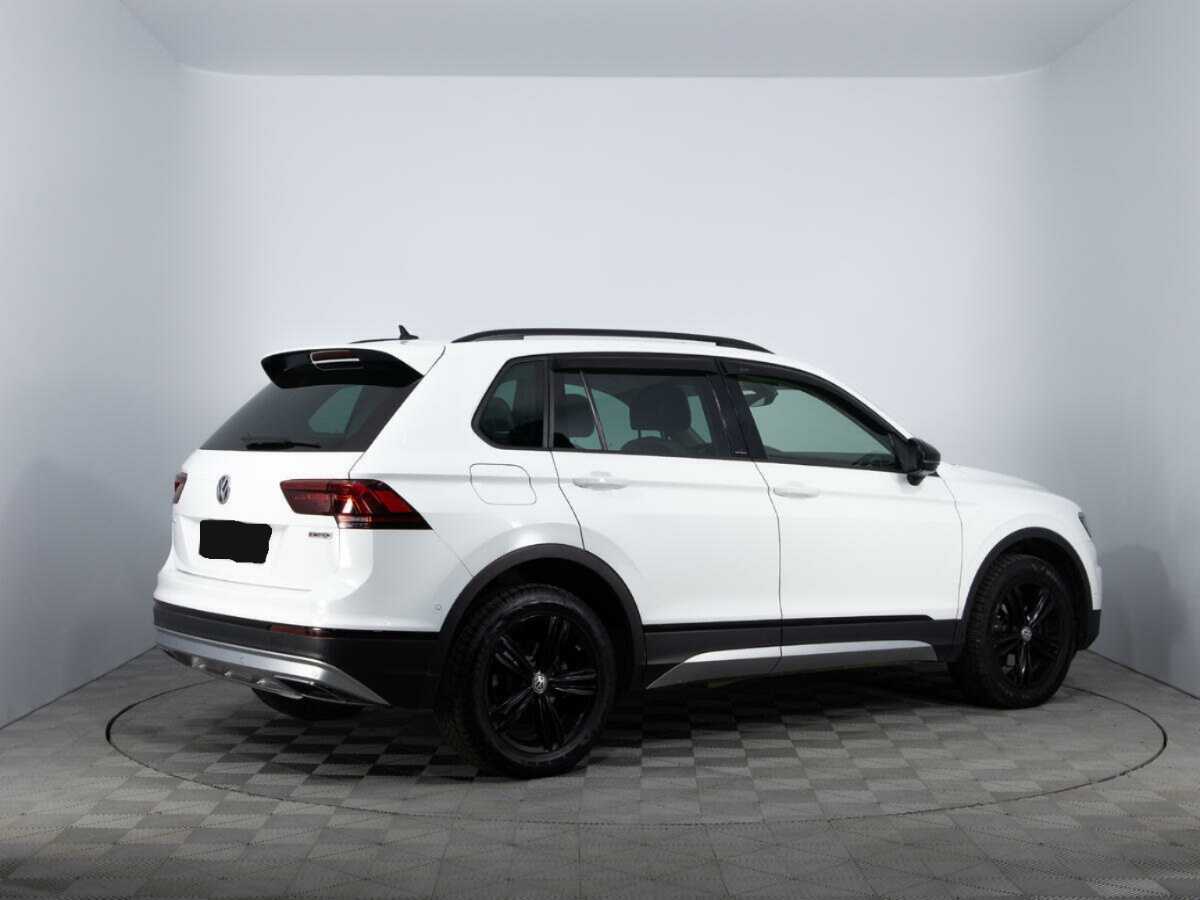 Купить Volkswagen Tiguan с пробегом. Фото: #4