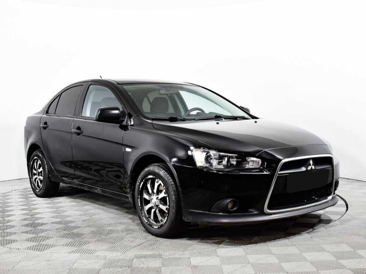 Купить Mitsubishi Lancer с пробегом. Фото: #2