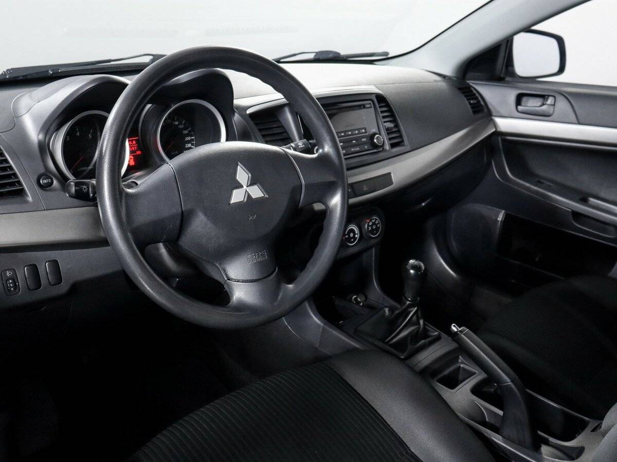 Купить Mitsubishi Lancer с пробегом. Фото: #12