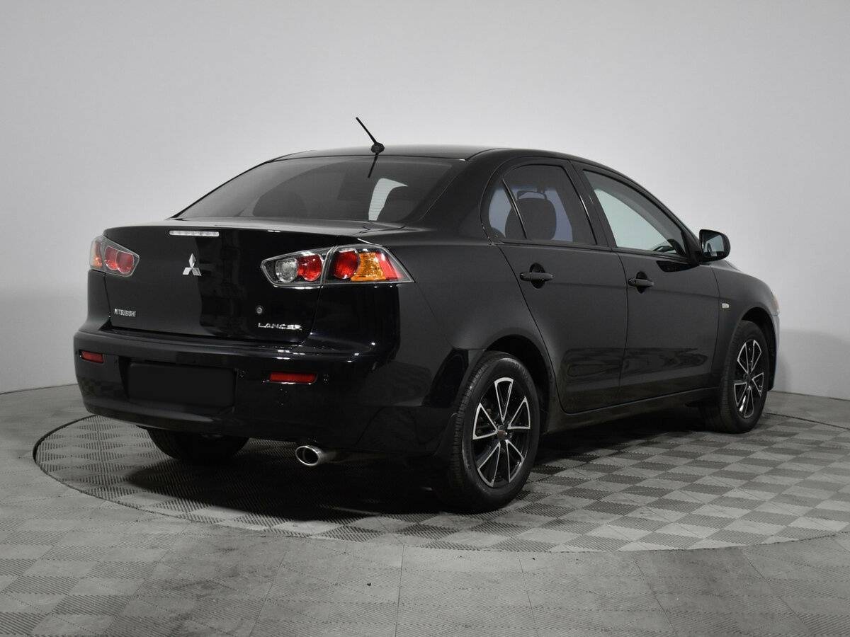 Купить Mitsubishi Lancer с пробегом. Фото: #4