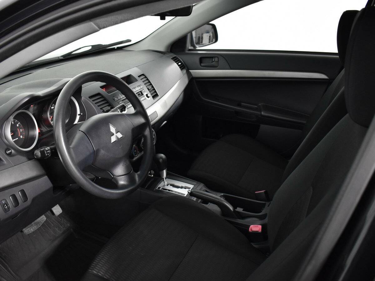 Купить Mitsubishi Lancer с пробегом. Фото: #8